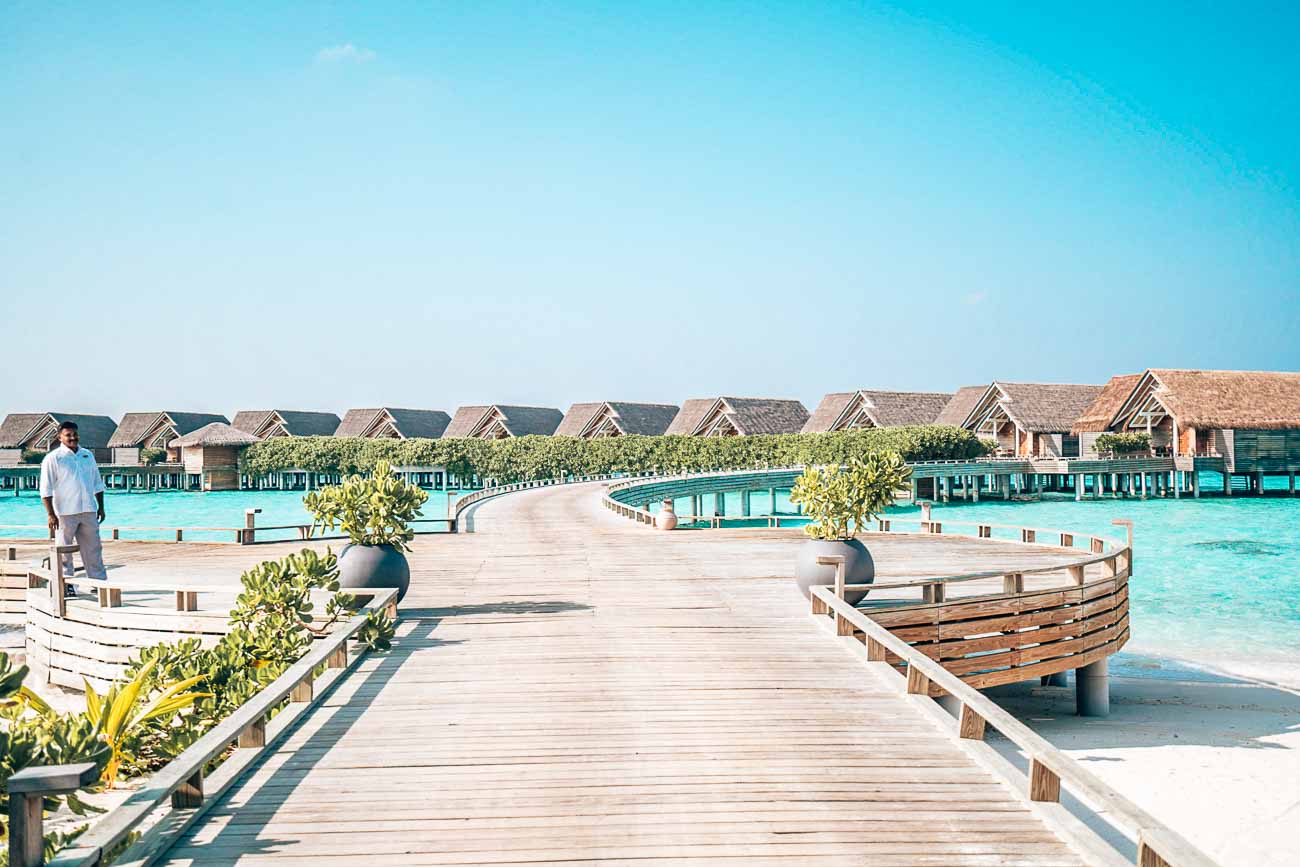 walkway to water pool villa milaidhoo maldives