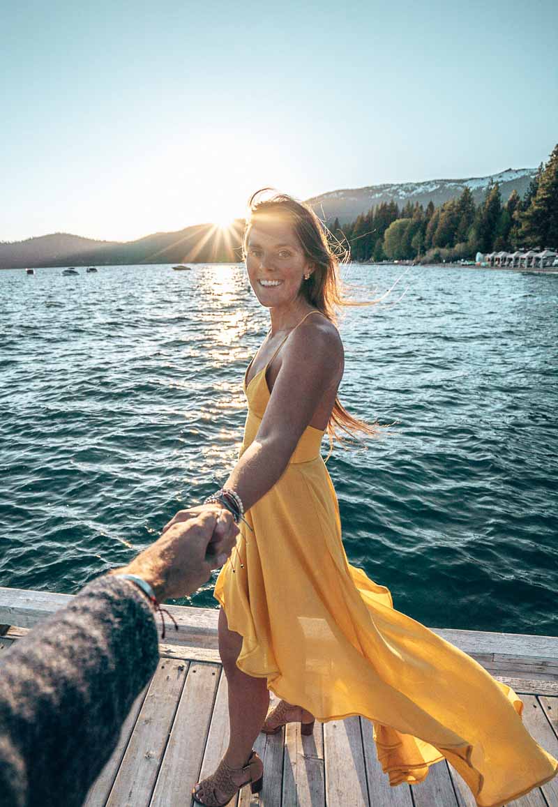 woman dancing at sunset lake tahoe