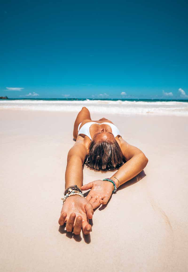 woman tanning on beach
