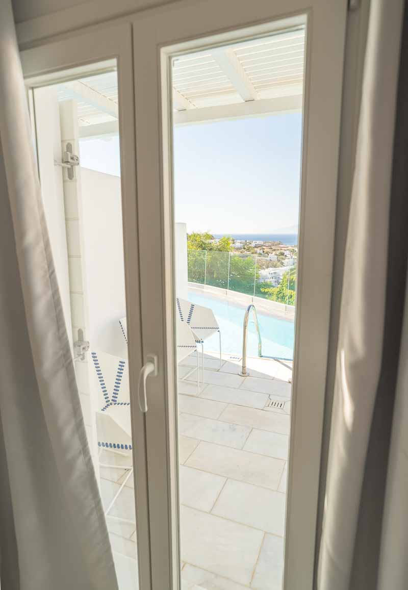 Myconian Ambassador thalasso suite with shared pool